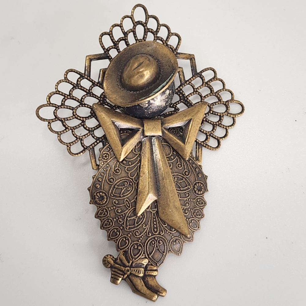 Cowgirl bow brooch